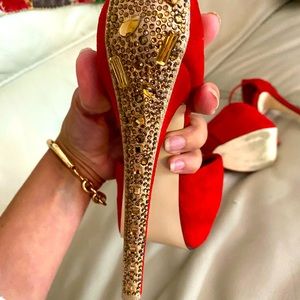 Strappie Red heels with gold gems on the stems
